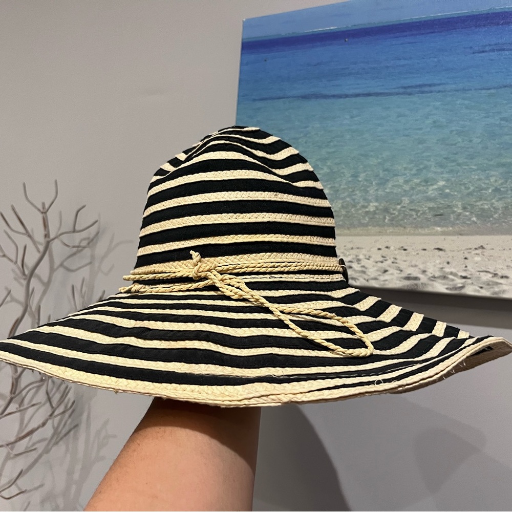 Panama Jack floppy wide brim beach hat.